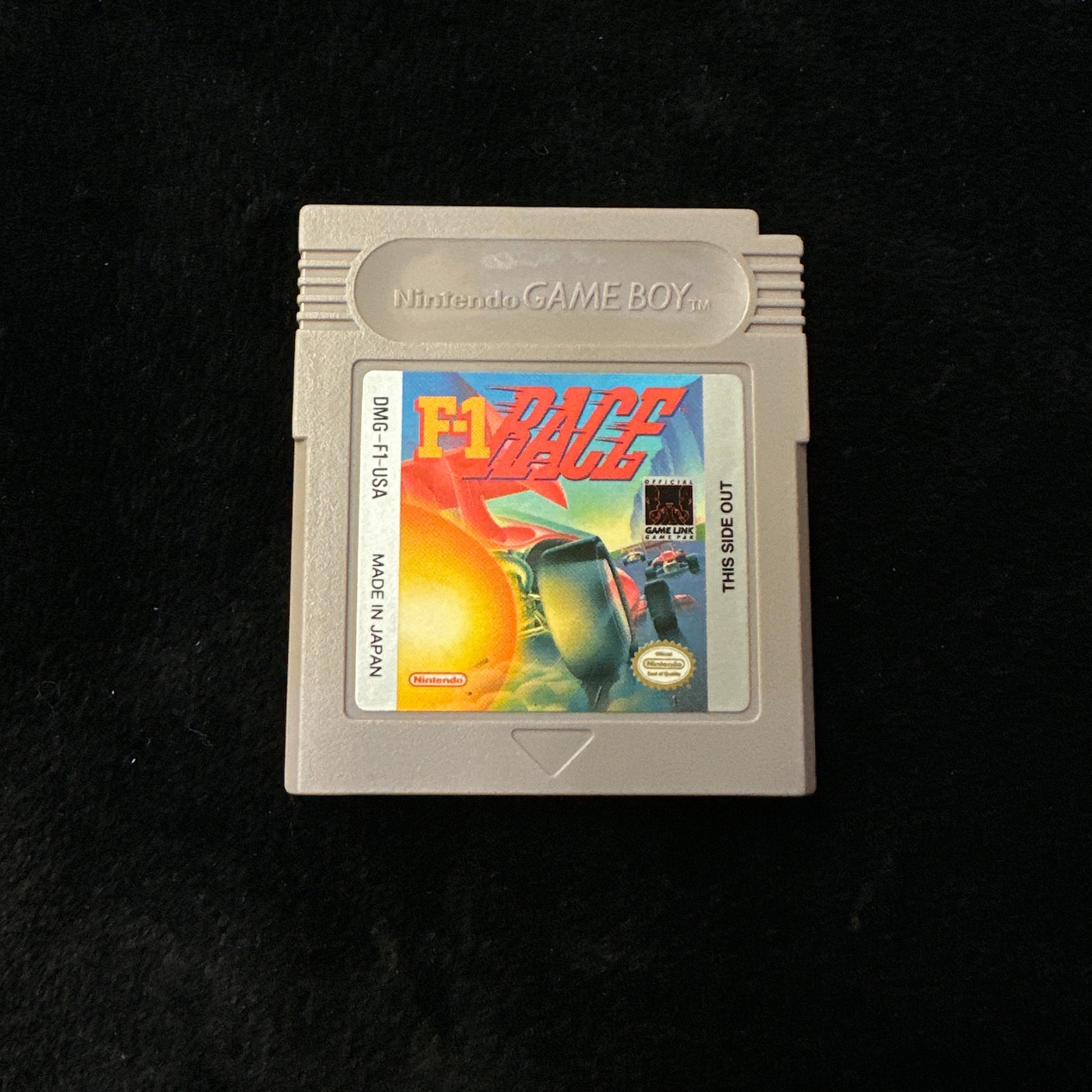 Game cartridge for a classic video game on a black background