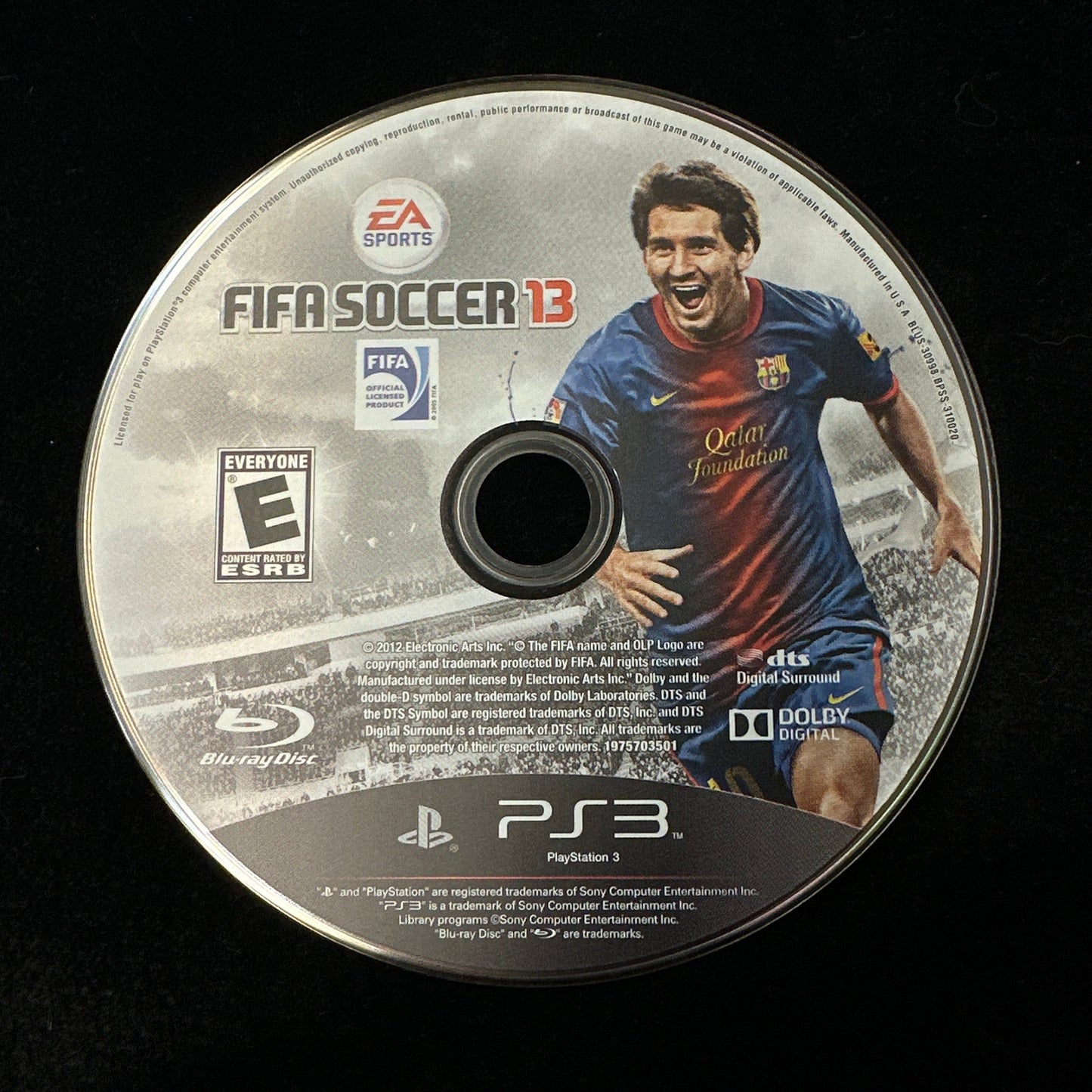 FIFA Soccer 13 game disc for PS3 on a black background