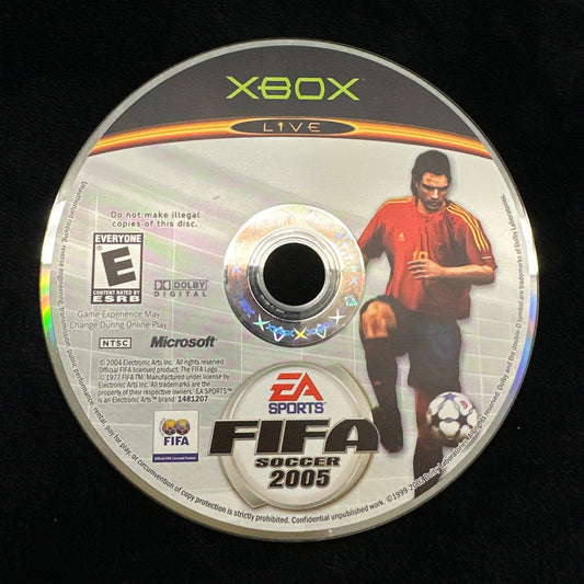 FIFA video game disc on a black background
