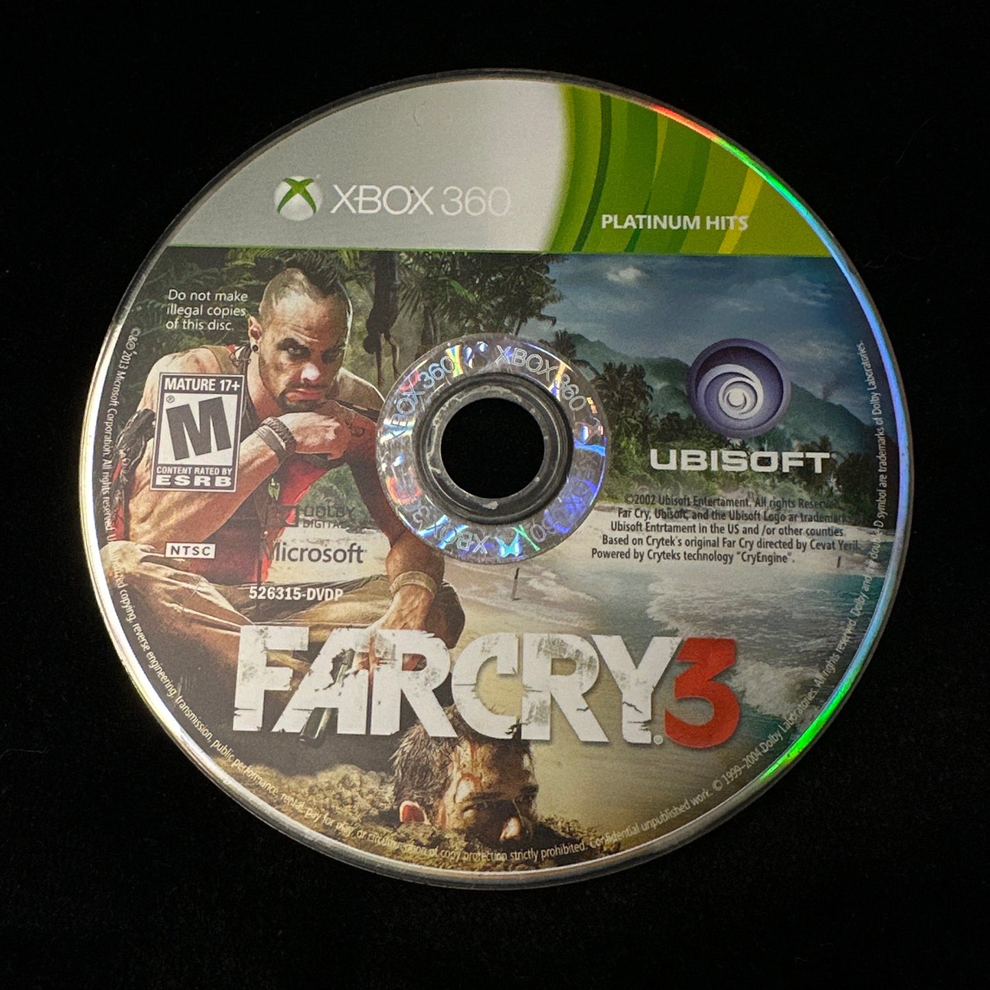 Game disc for 'Far Cry 3' on a black background