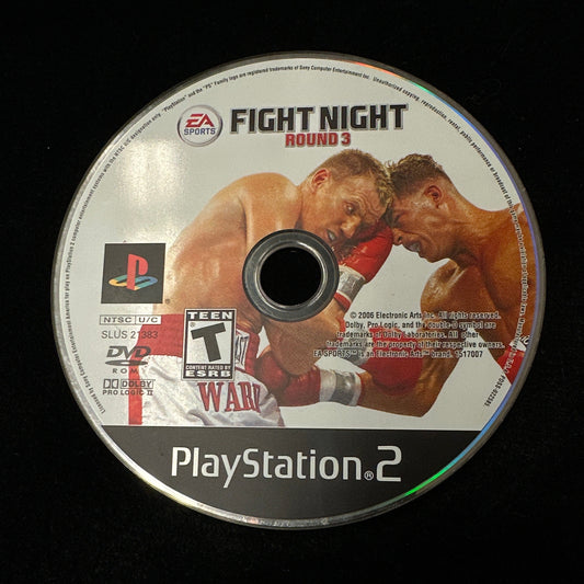 PlayStation 2 game disc with boxing graphics on a black background