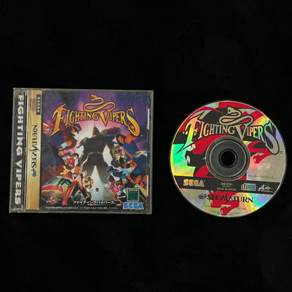CD and cover of 'Fighting Vipers' video game on a black background
