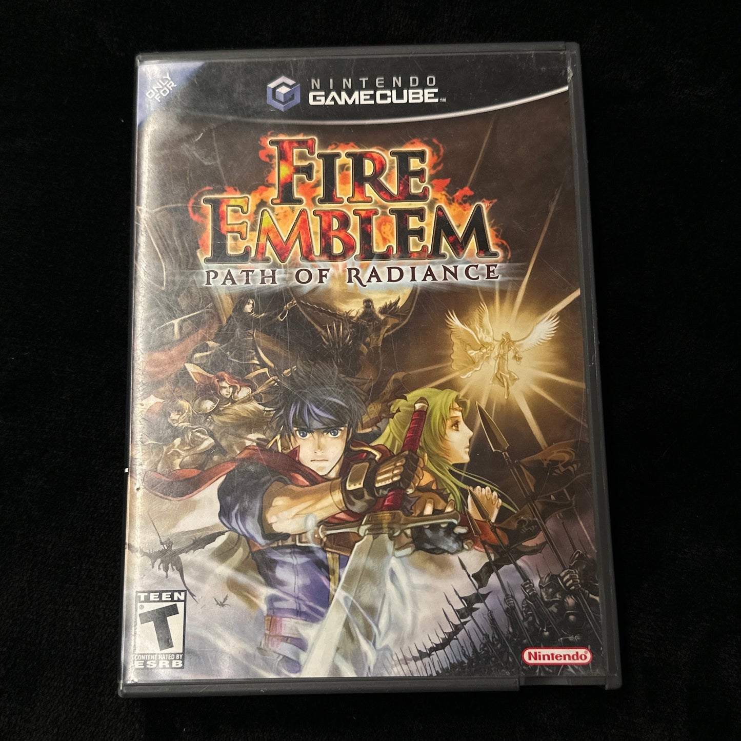 Fire Emblem game case on a dark surface