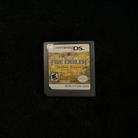 Game cartridge for 'Fire Emblem' on a black background