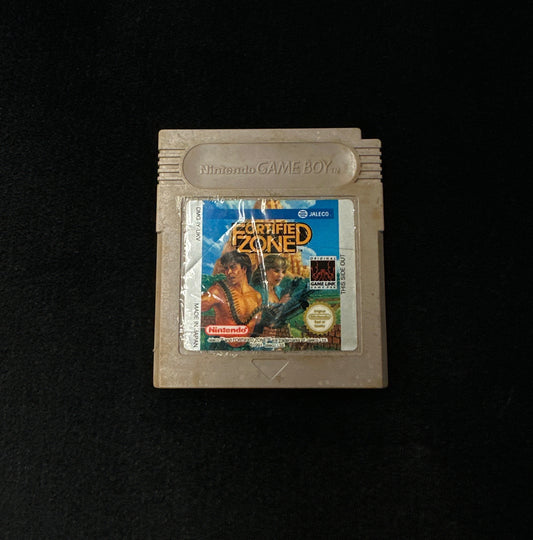 Game cartridge with a label on a black background
