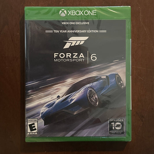 Forza Motorsport 6 game case for Xbox One on a wooden surface