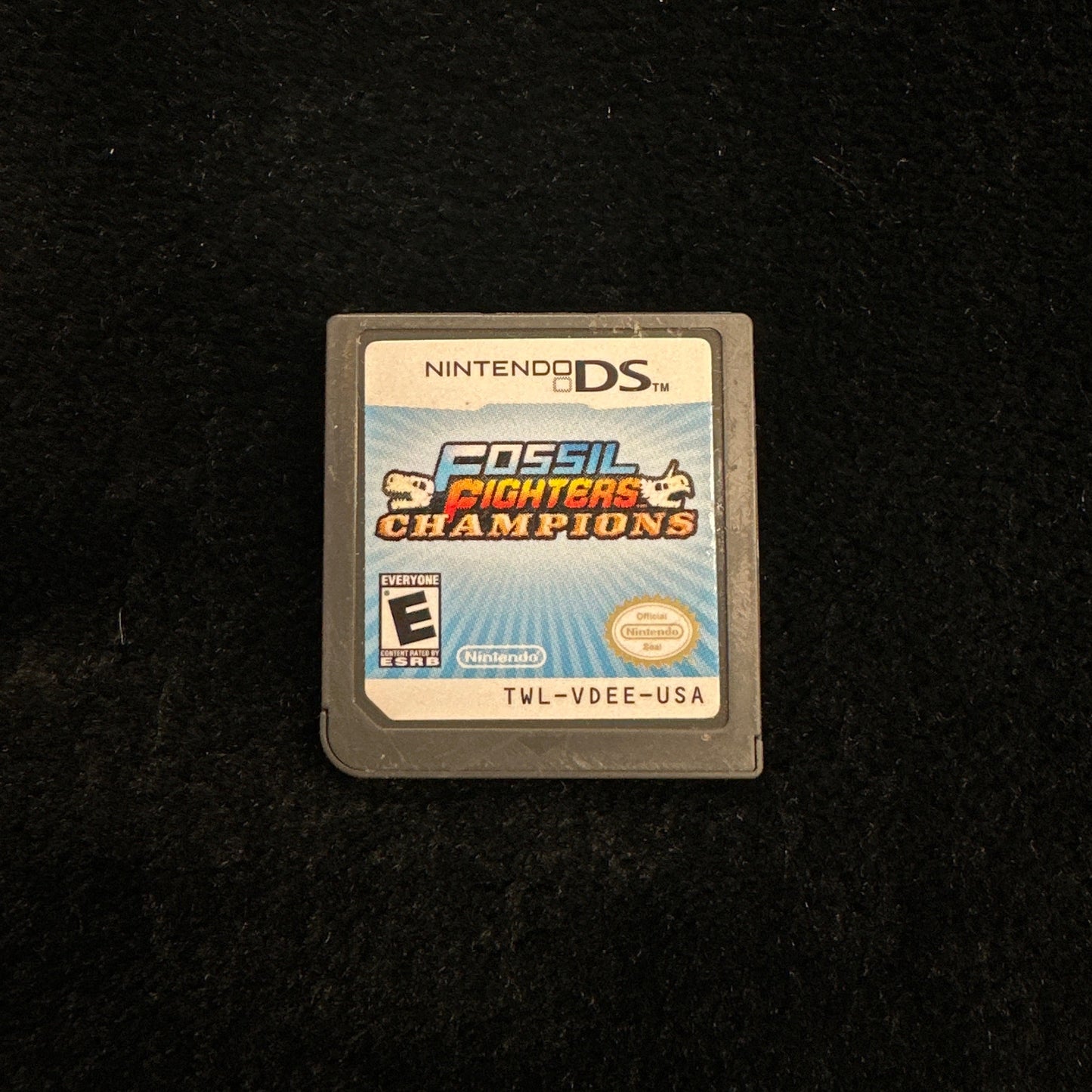 Nintendo DS game cartridge on a black background