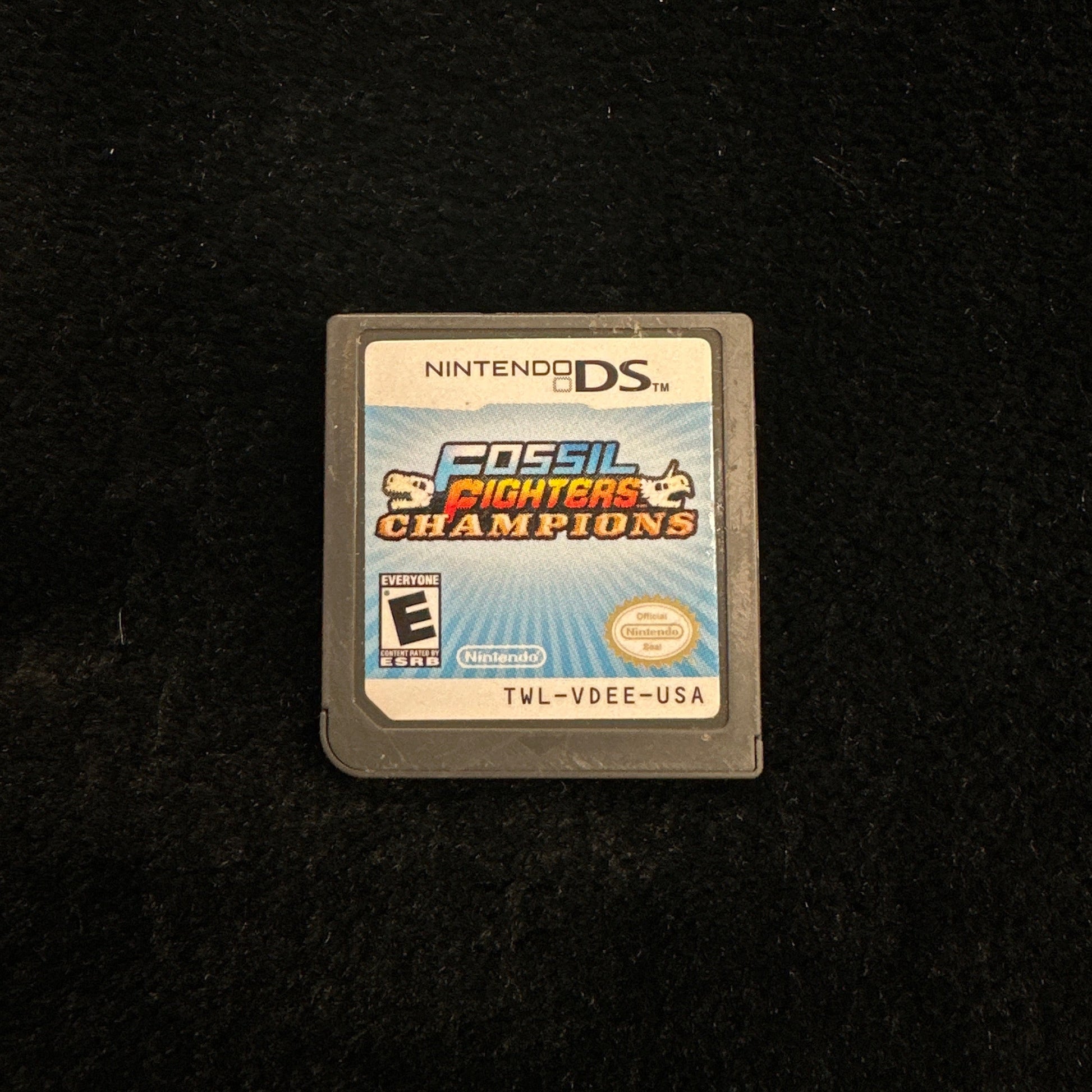Nintendo DS game cartridge on a black background