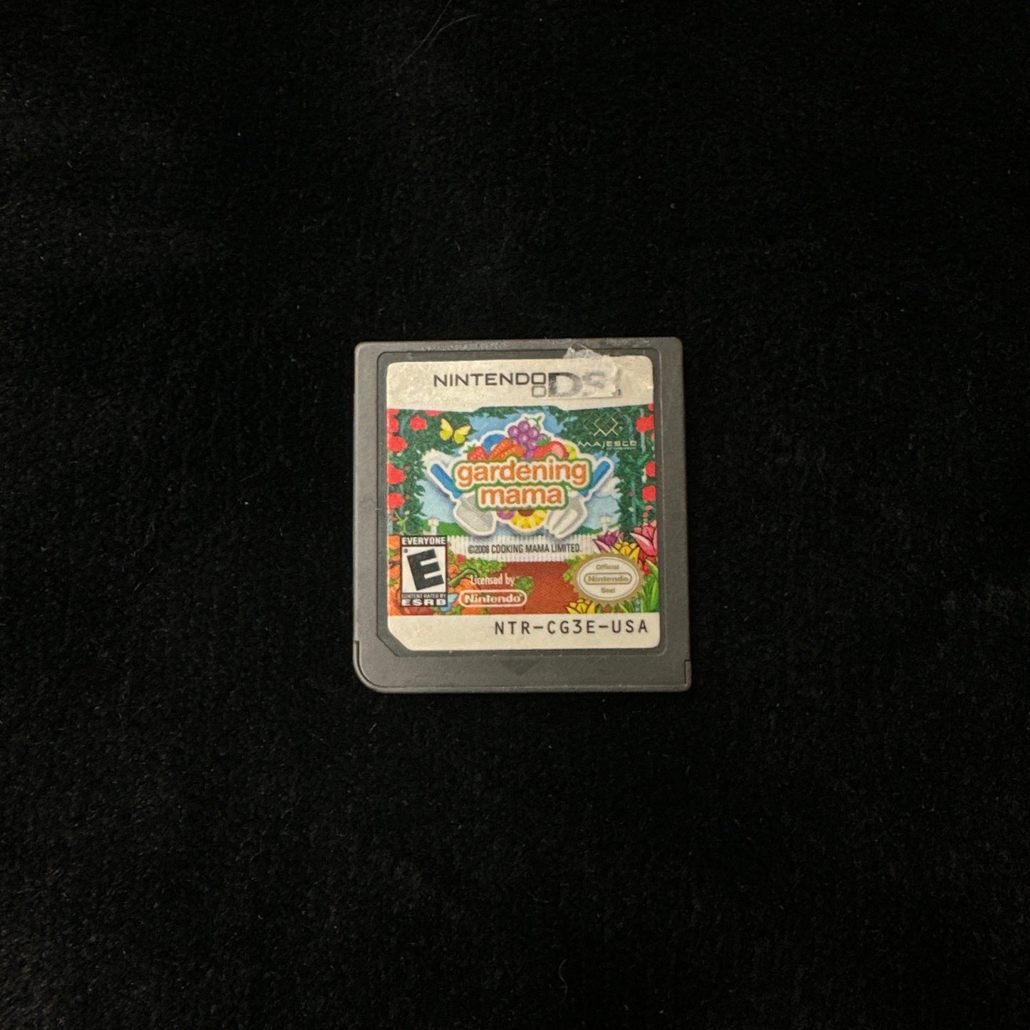 Game cartridge on a black background