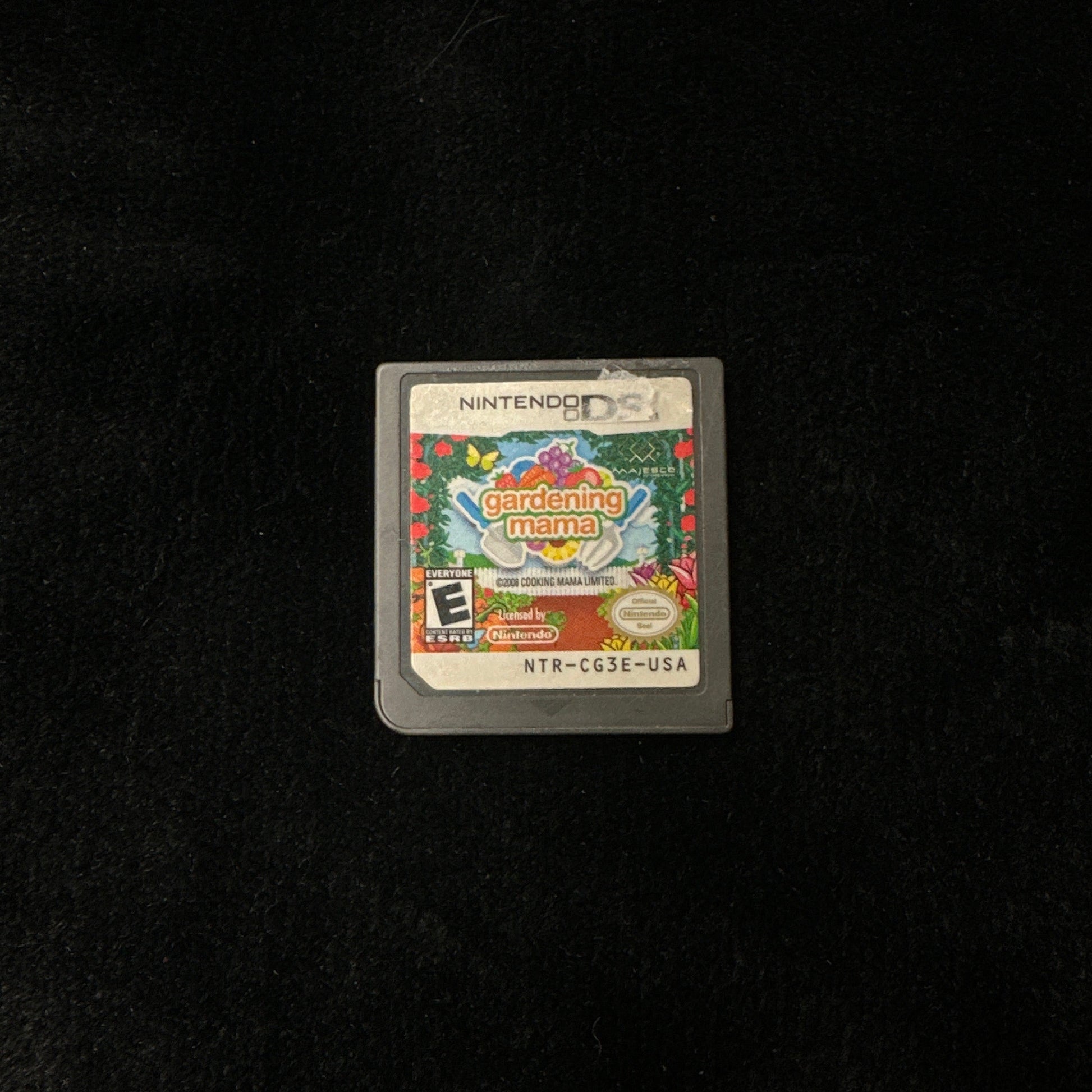 Game cartridge on a black background