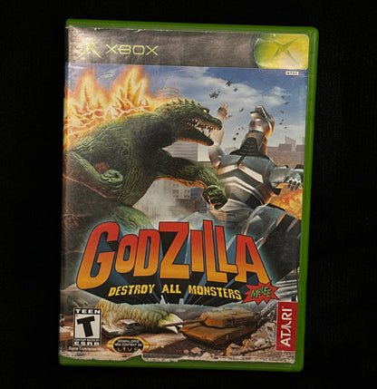 Vintage 'Godzilla' video game case for Xbox Atari on a black background