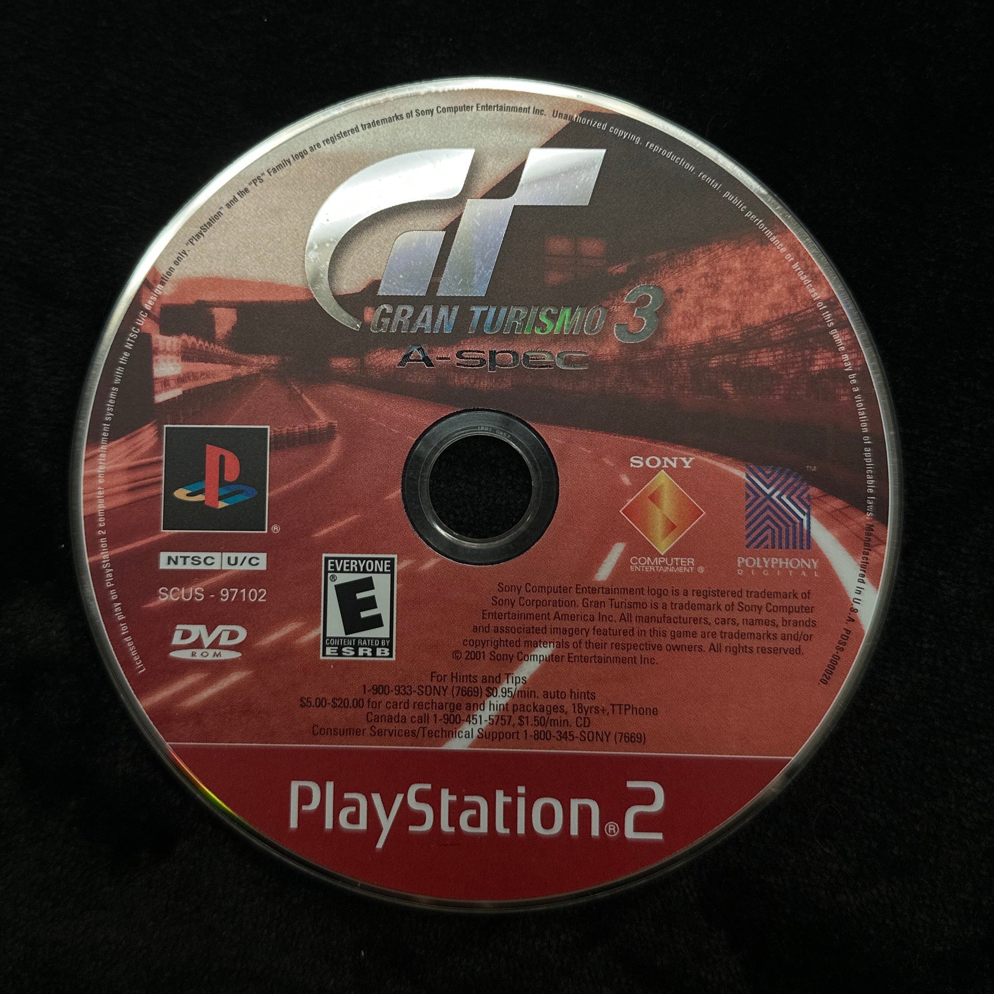 PlayStation 2 game disc on a black background