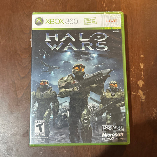 Halo Wars game case for Xbox 360 on a wooden surface