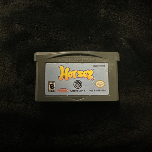 Game cartridge on a dark textured surface