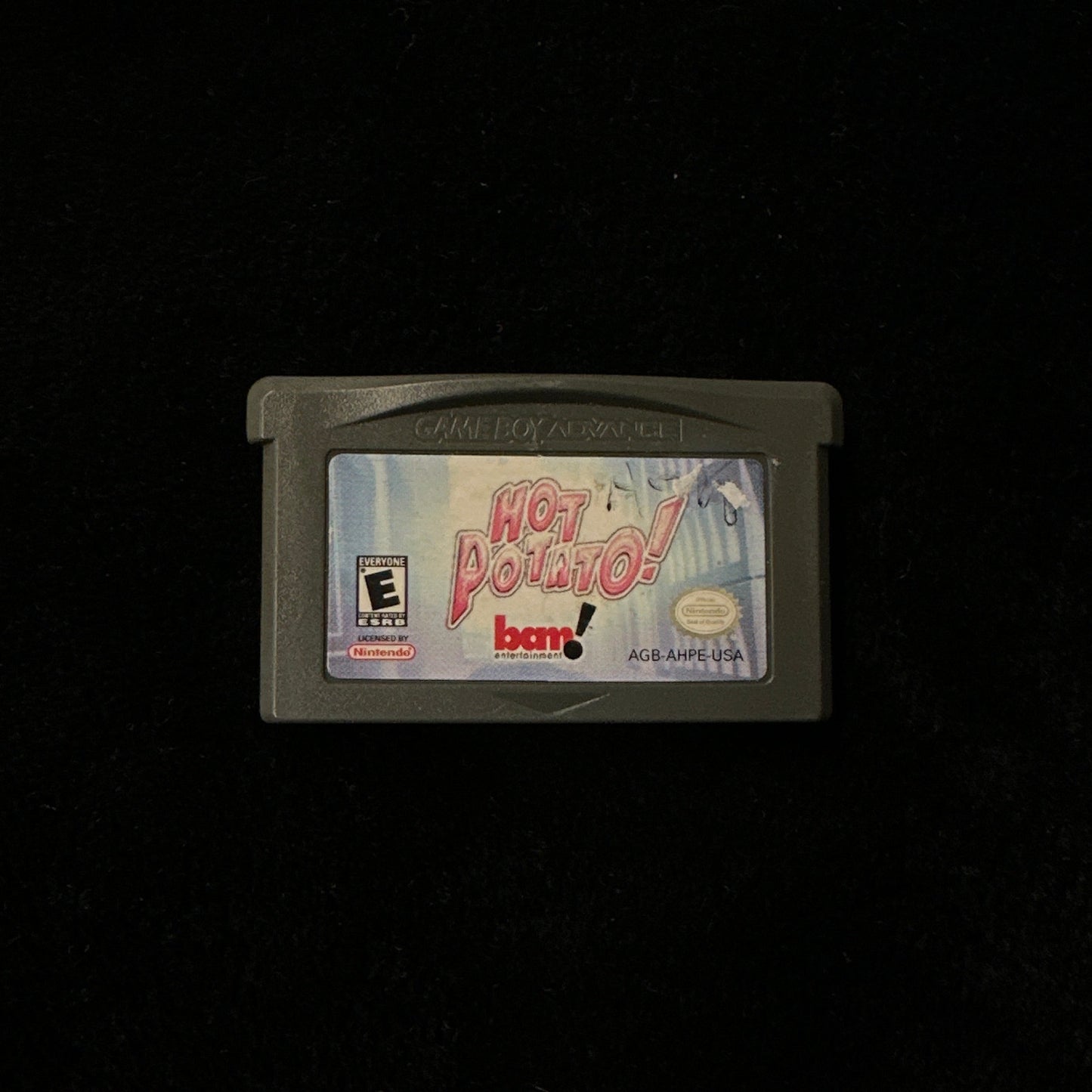 Game cartridge on a black background