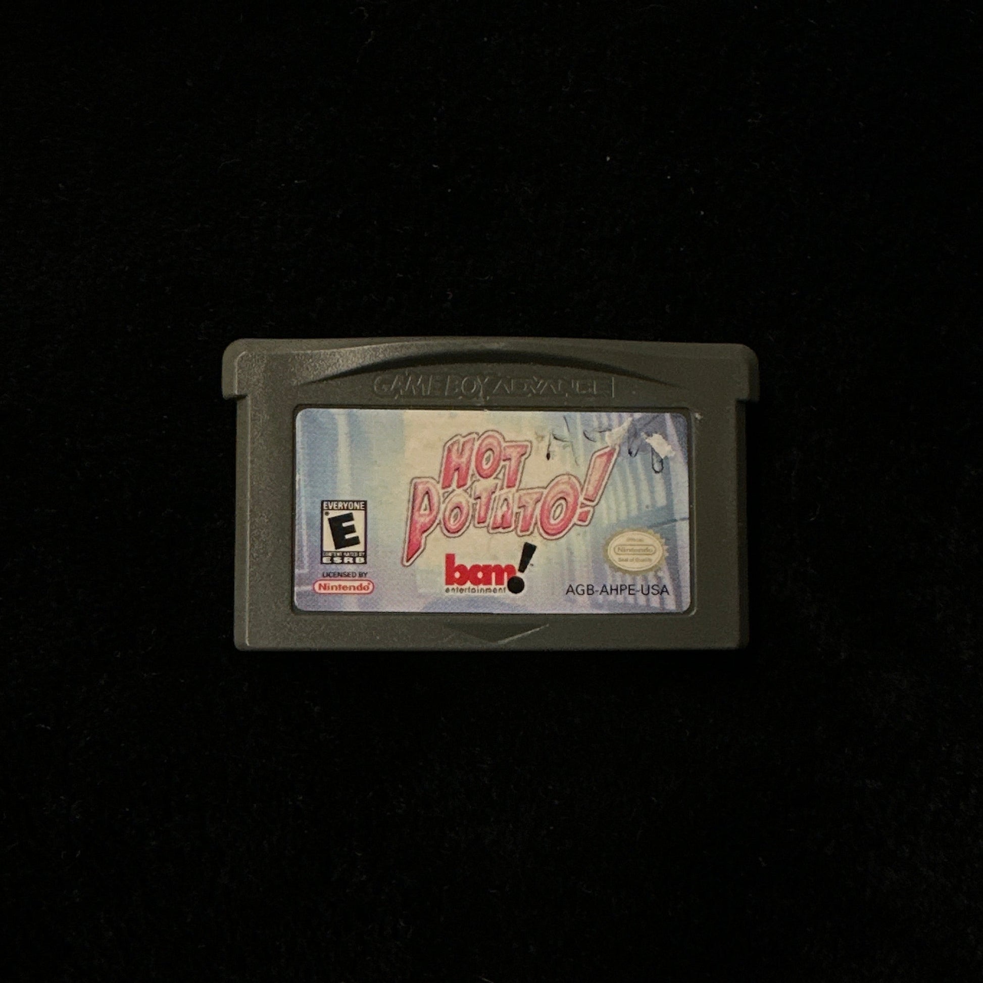 Game cartridge on a black background