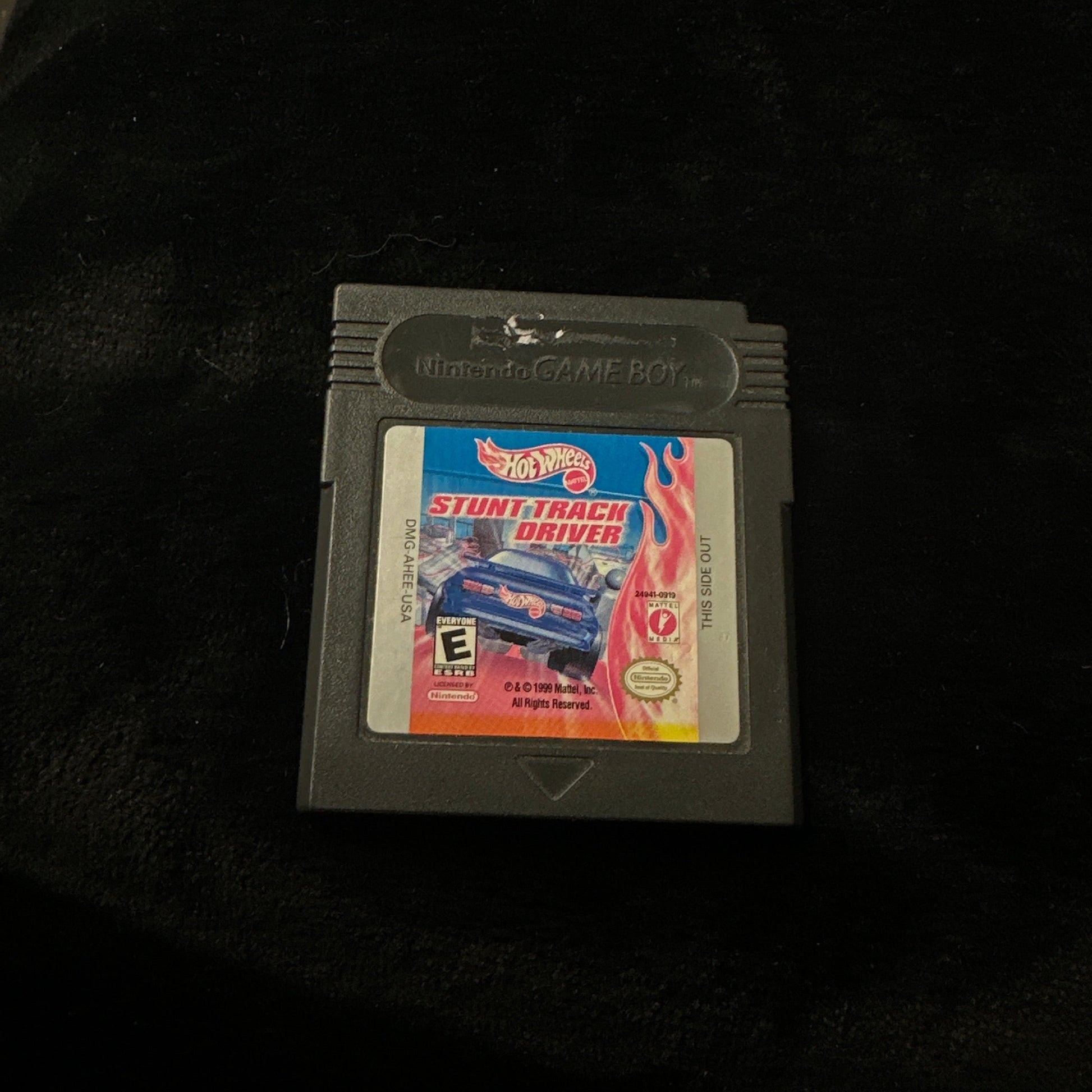 Game cartridge on a dark surface