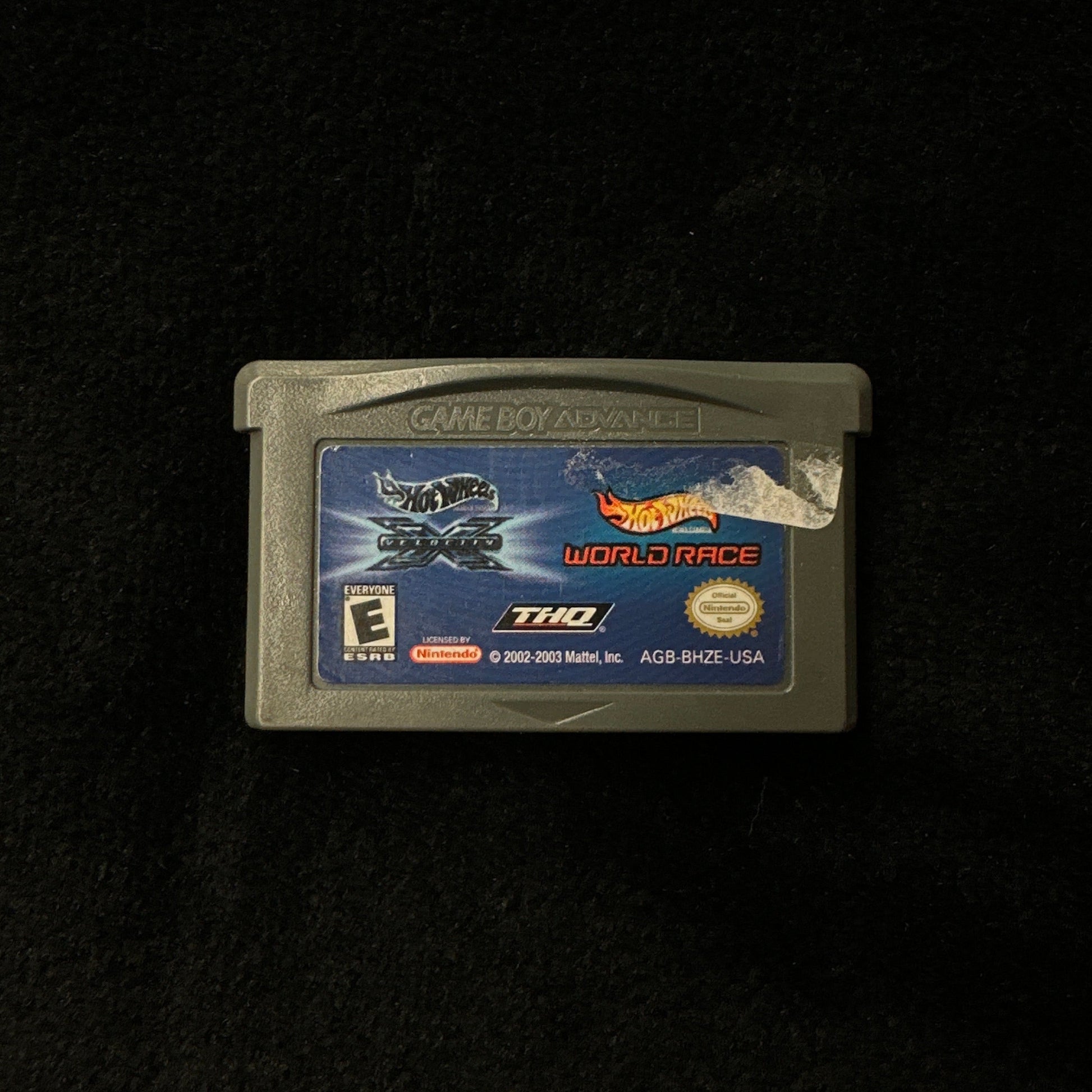 Game cartridge on a black background