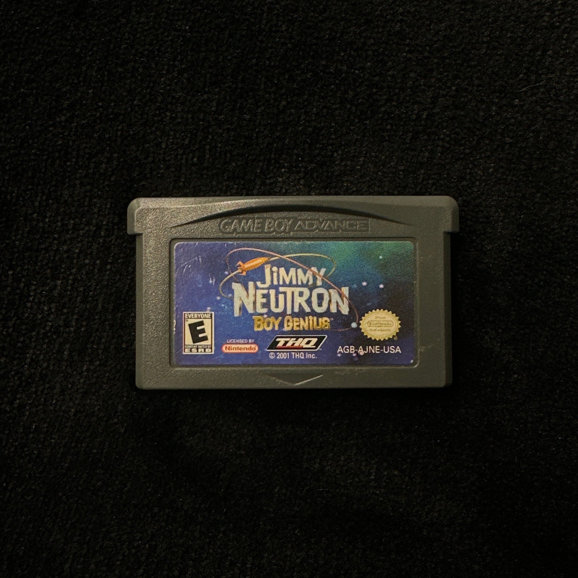 Game cartridge on a black background