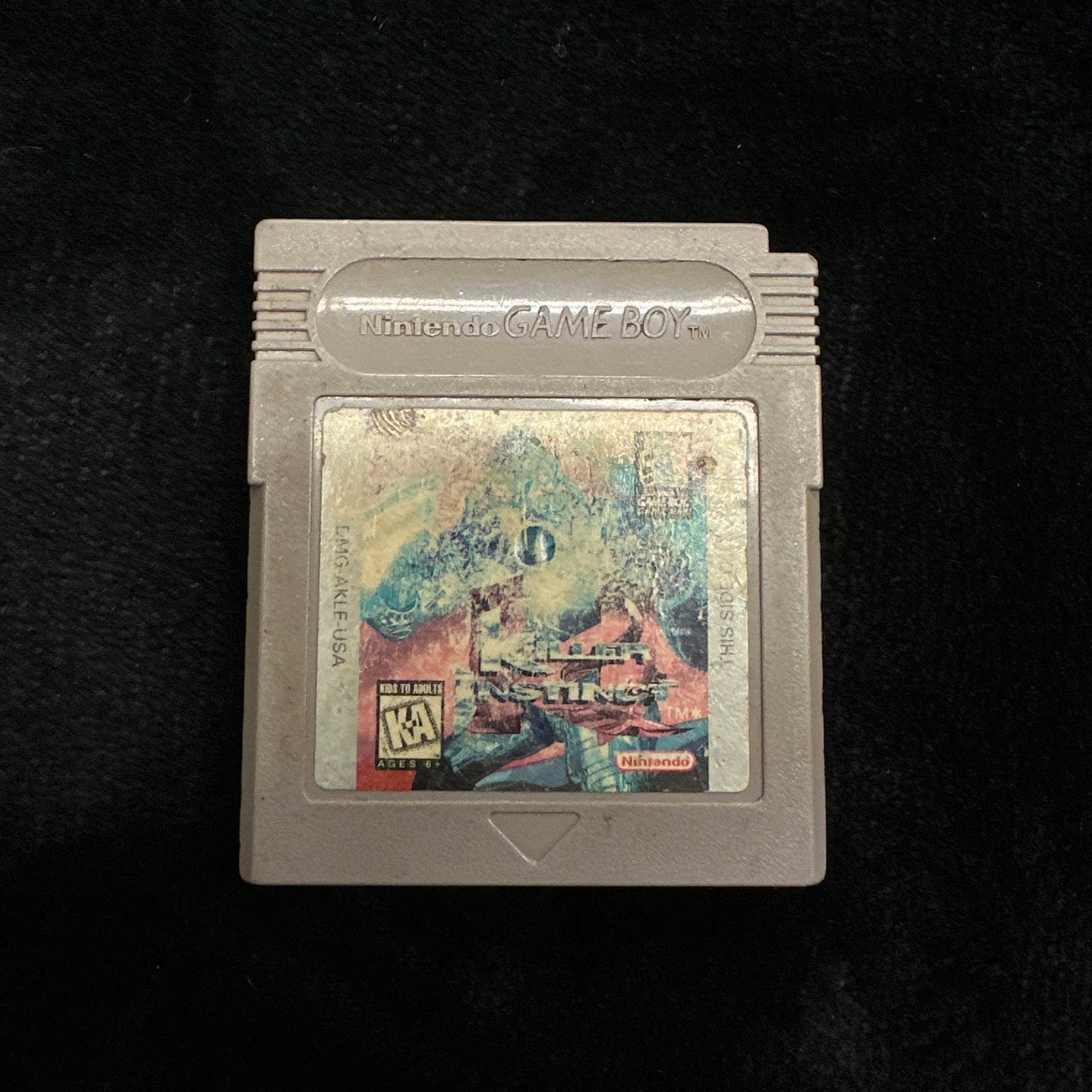 Game cartridge on a black background