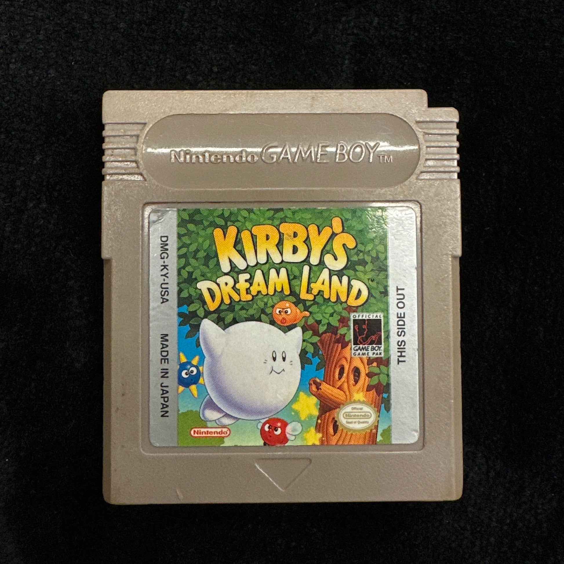 Game cartridge for 'Kirby's Dream Land' on a black background