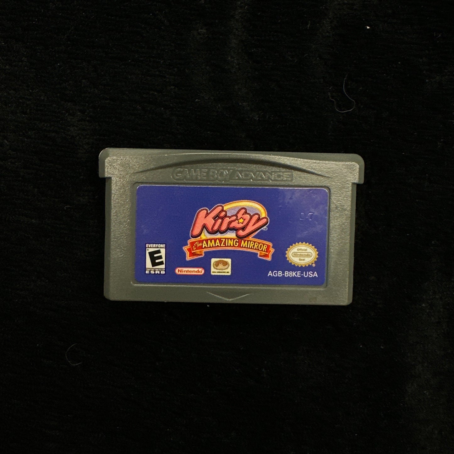 Game cartridge on a black background