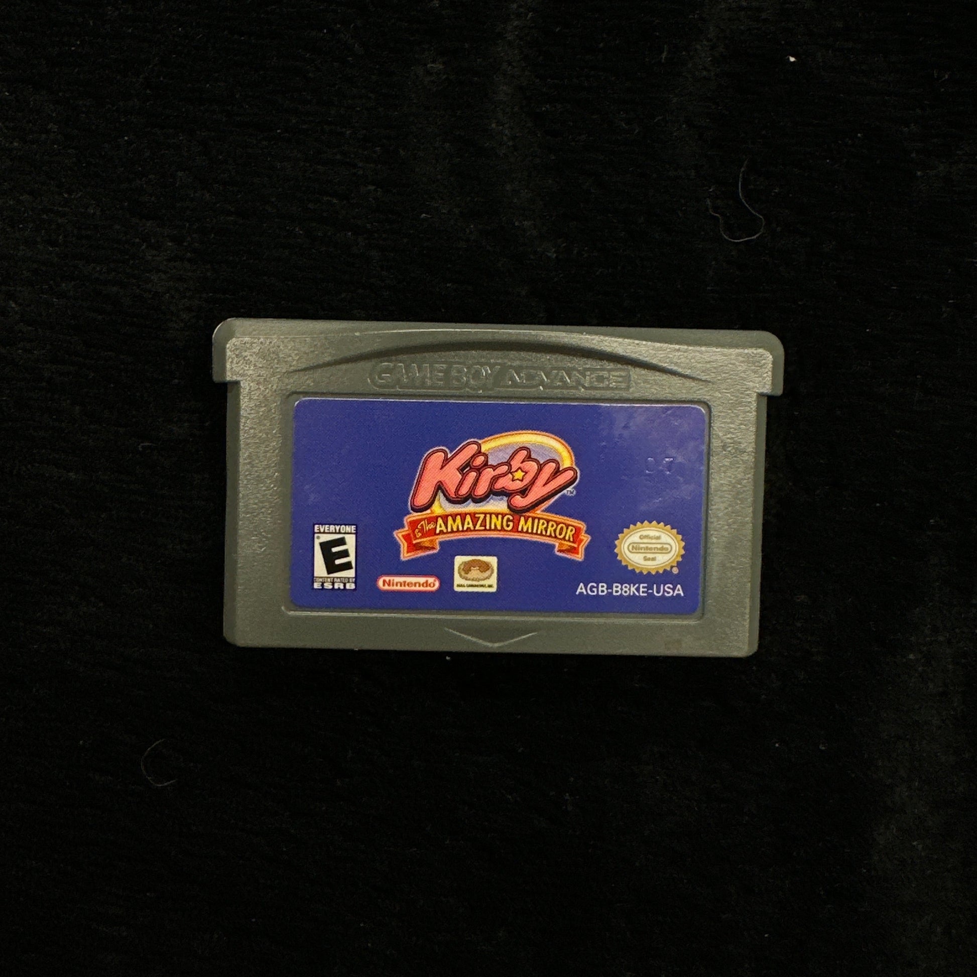 Game cartridge on a black background