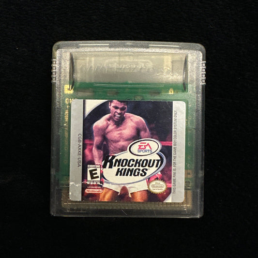 Game cartridge with a boxing-themed label on a black background