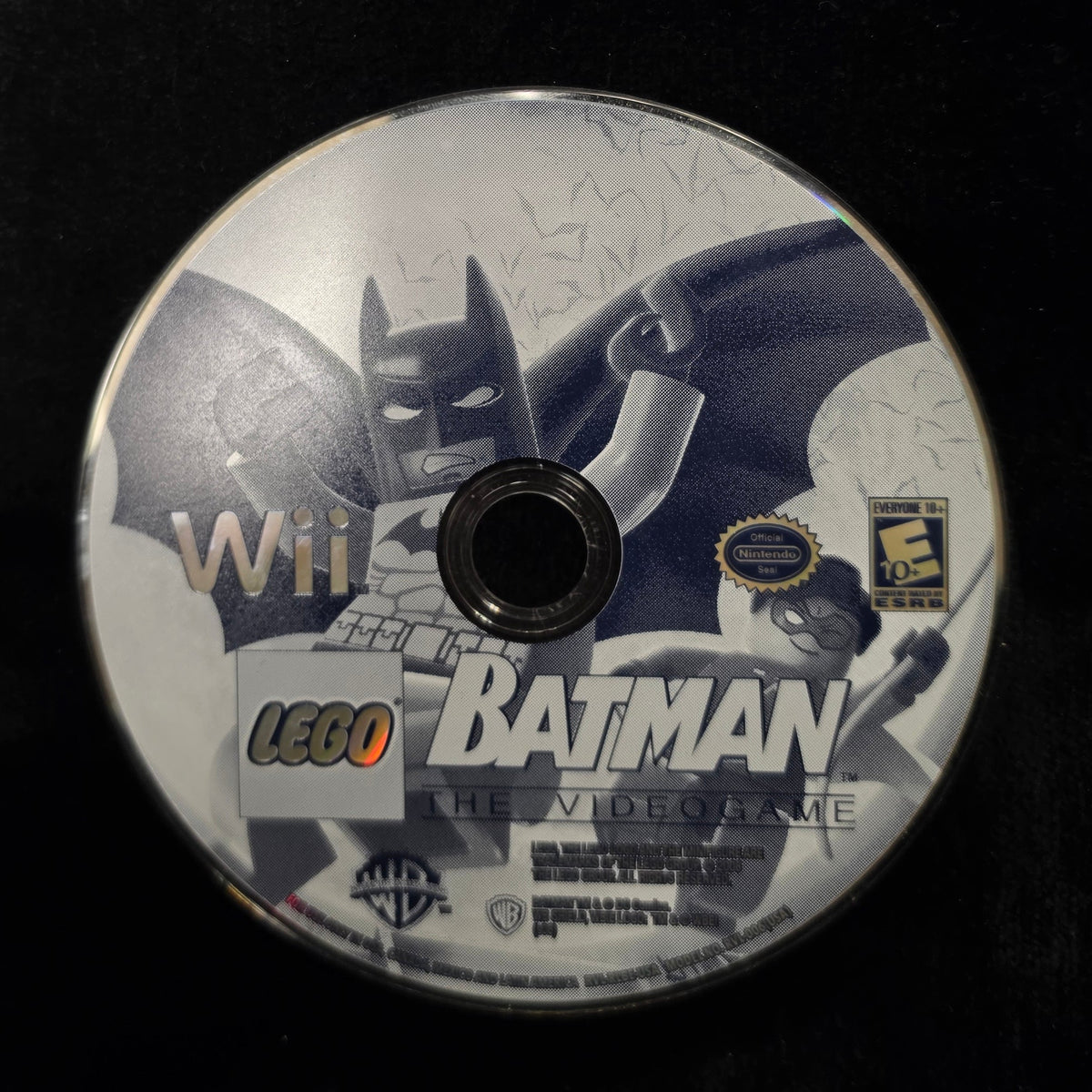 LEGO Batman The Videgame for Nintendo Wii console game disc, featuring Batman and LEGO branding on a black background.