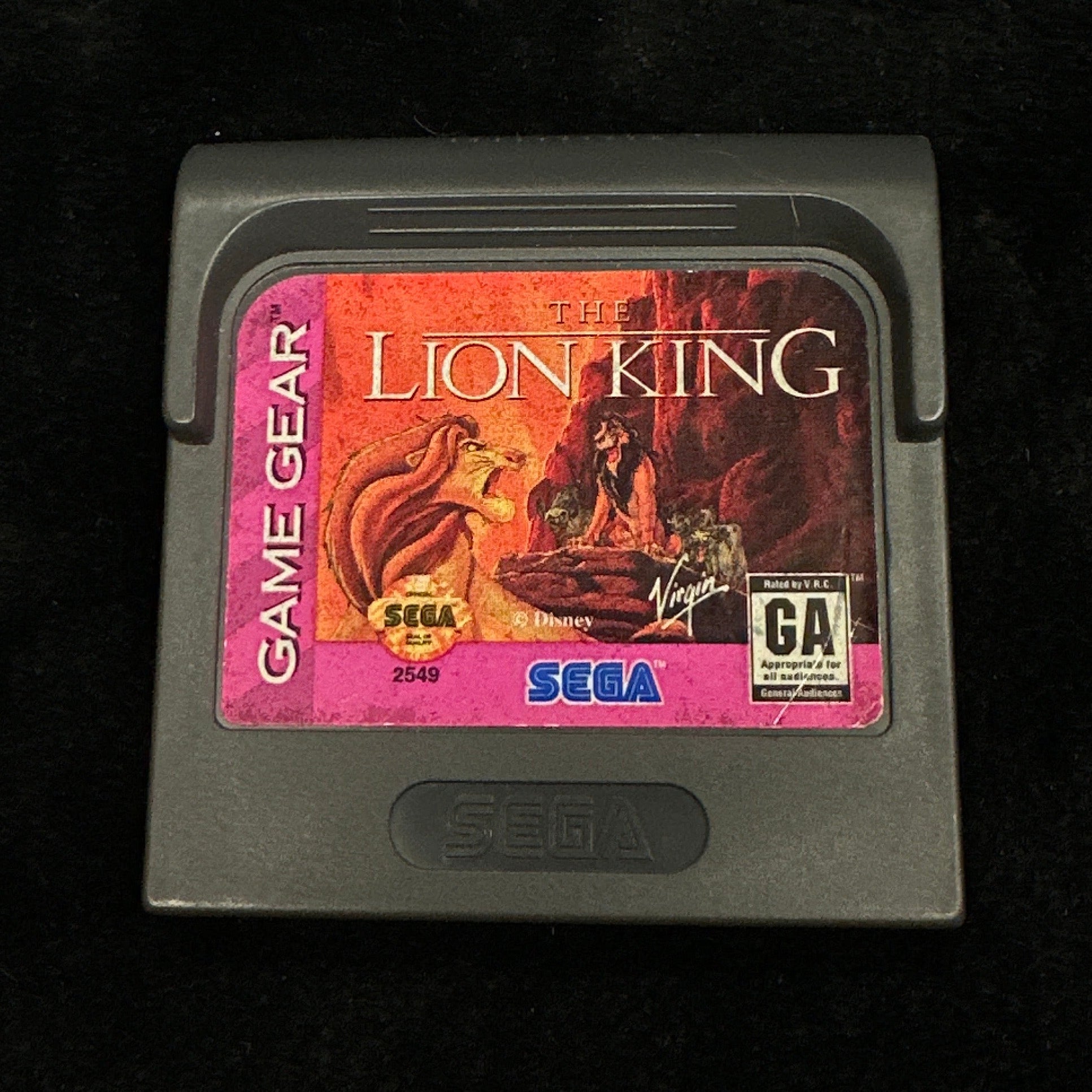Sega game cartridge for 'The Lion King' on a dark background