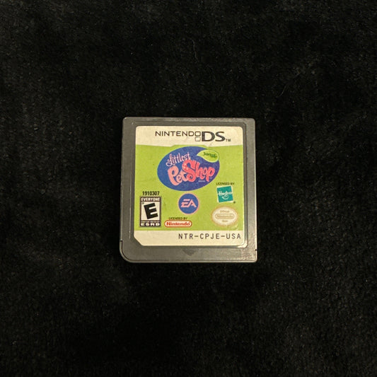 Nintendo DS game cartridge on a dark surface