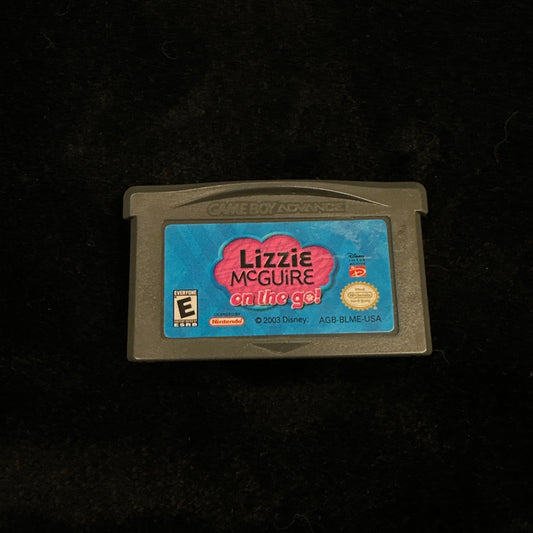 Game cartridge with 'Lizzie McGuire' branding on a dark background
