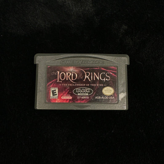 Game cartridge for 'The Lord of the Rings' on a dark background