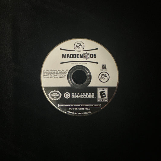 A single PlayStation 2 game disc for Madden 06 on a black background.