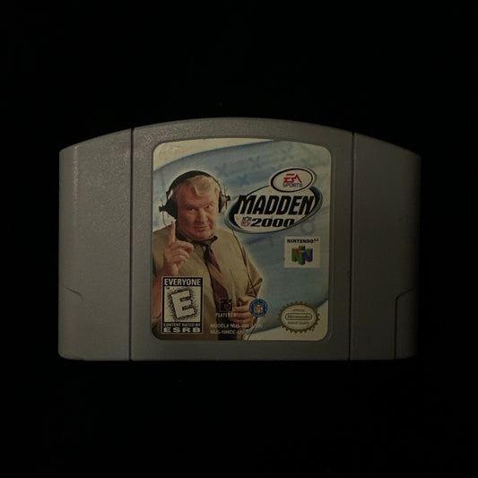 A Nintendo 64 Madden 2000 video game cartridge shown against a dark black background.