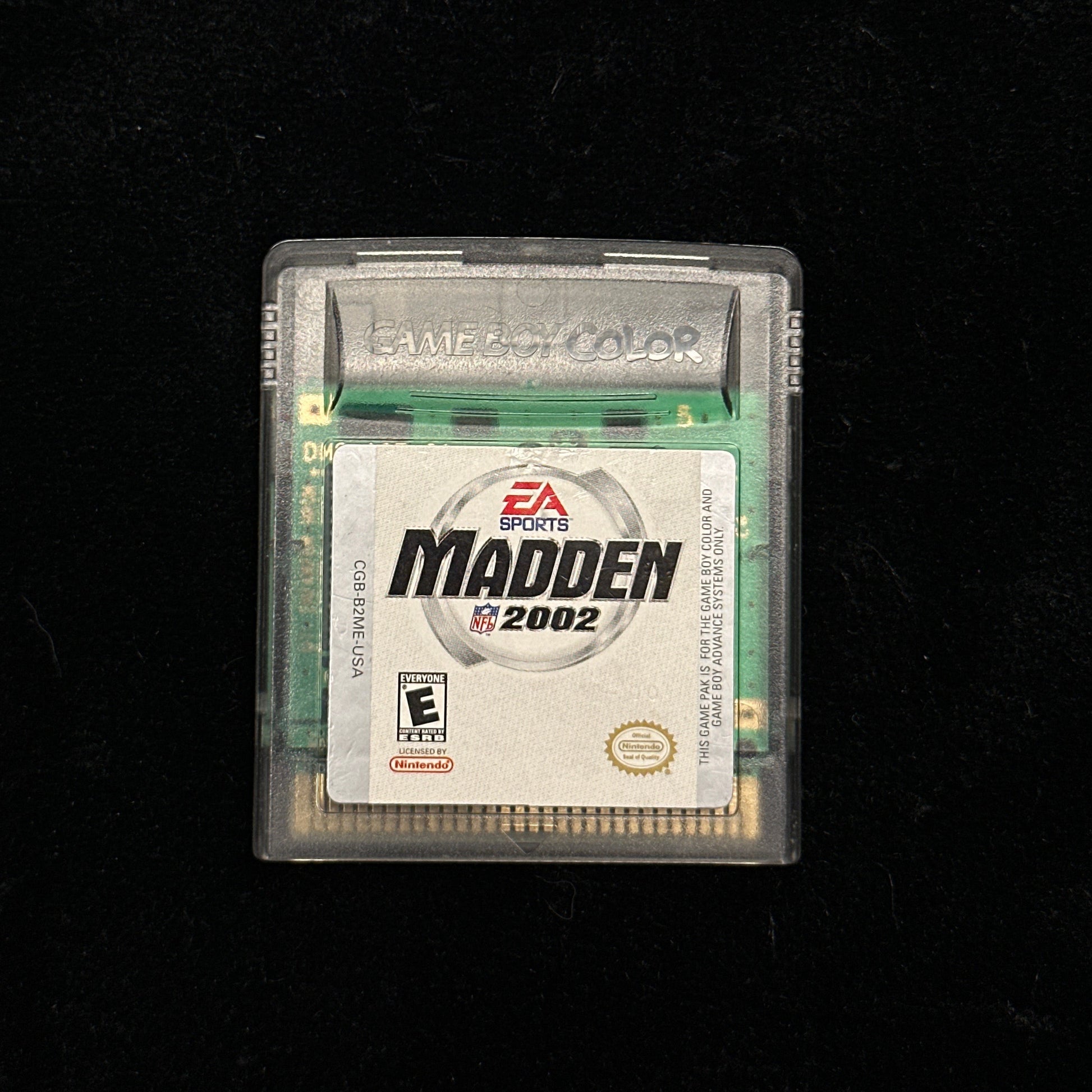 Gaming cartridge for 'Madden 2002' on a black background