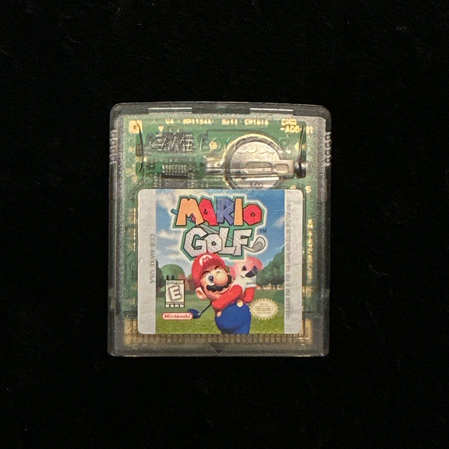 Game cartridge for 'Mario Golf' on a black background