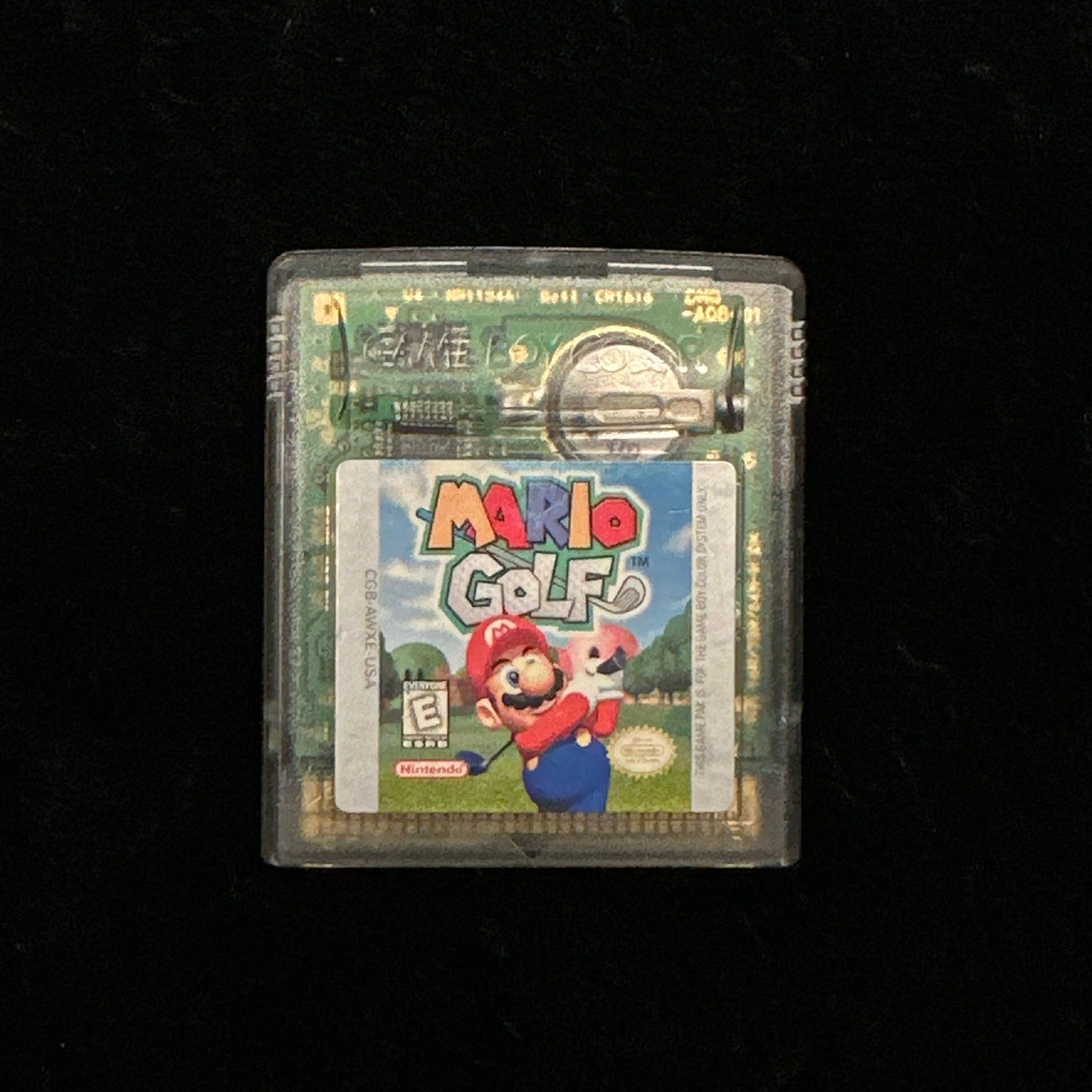 Game cartridge for 'Mario Golf' on a black background