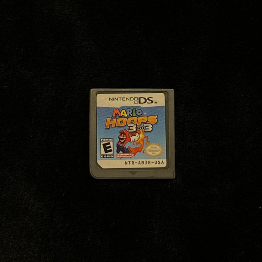 Small game cartridge on a dark surface