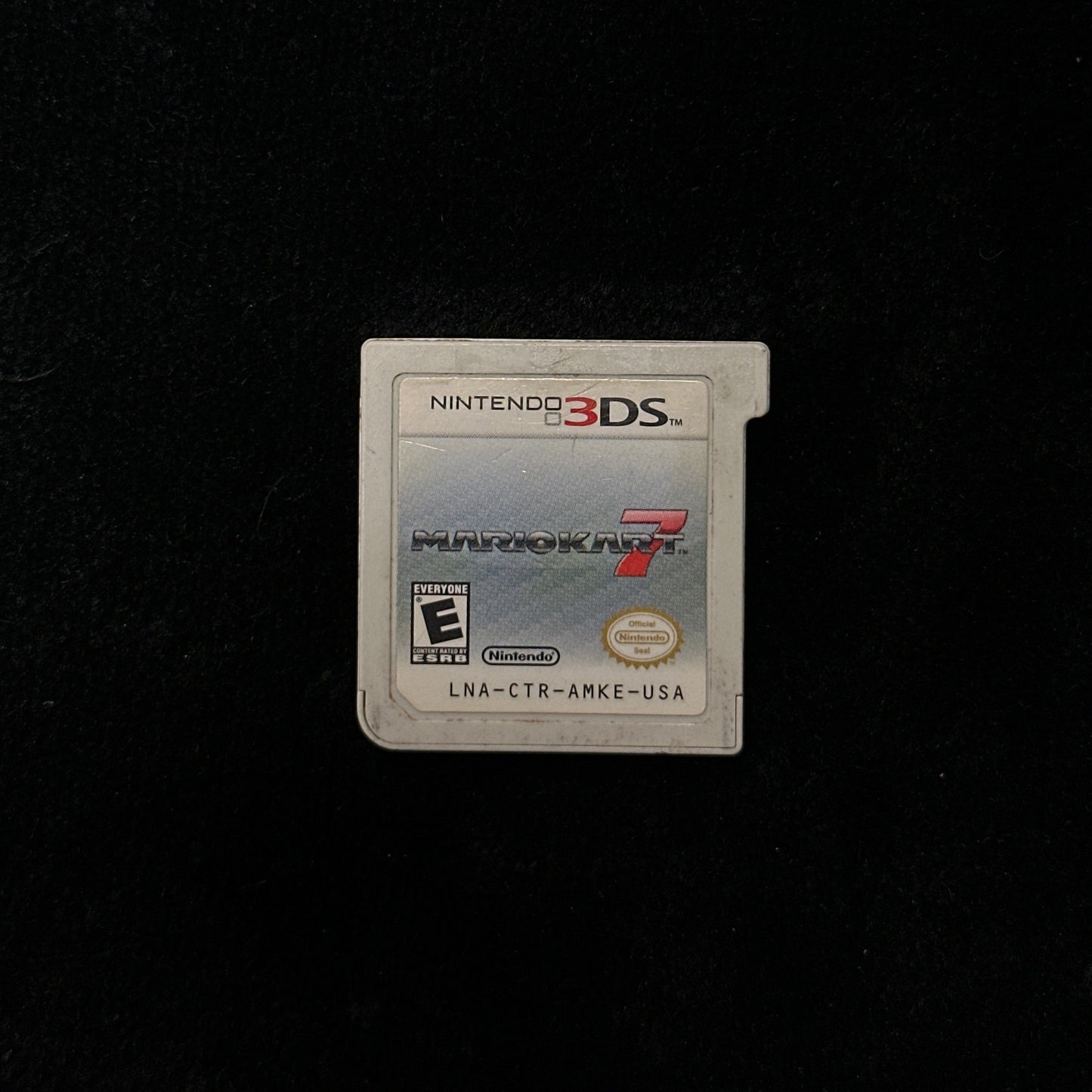 Nintendo 3DS game cartridge on a black background