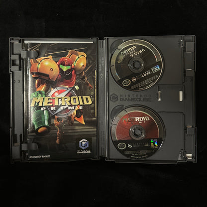 Open game case with 'Metroid Prime' on a dark surface