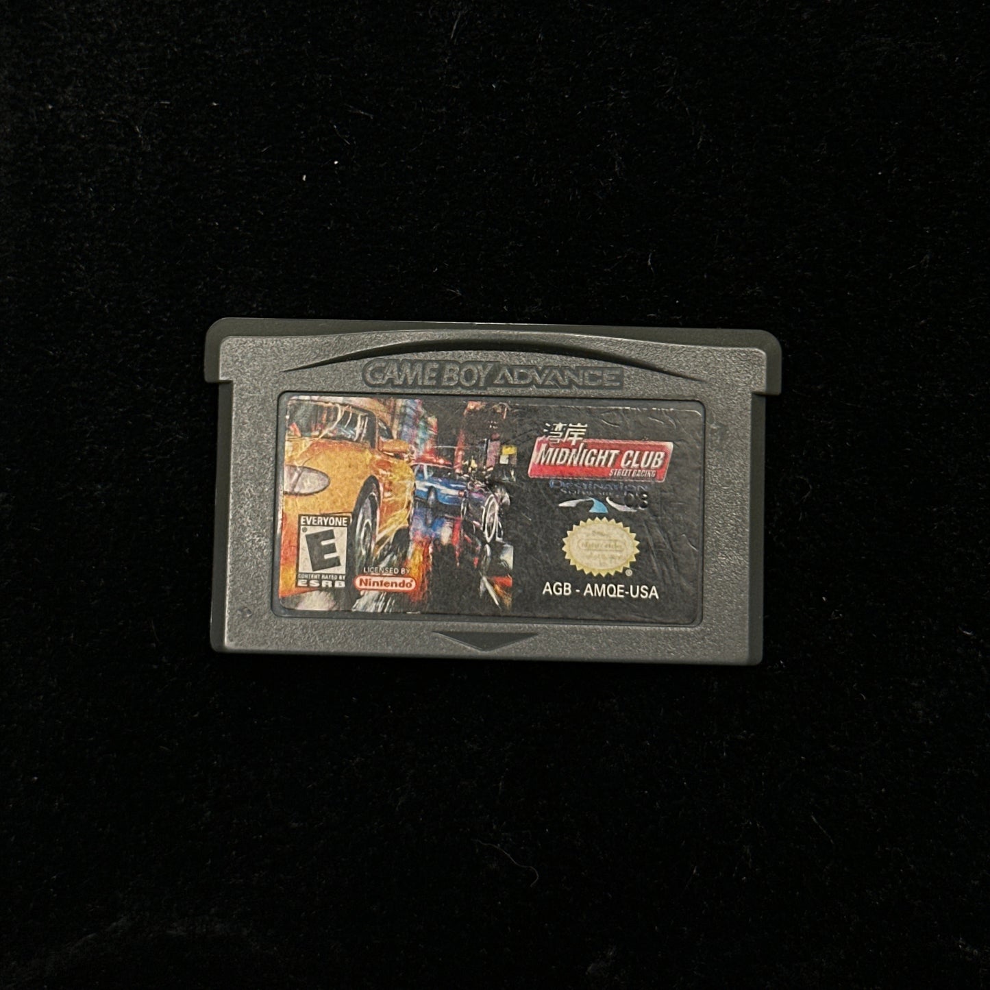 Game cartridge on a black background