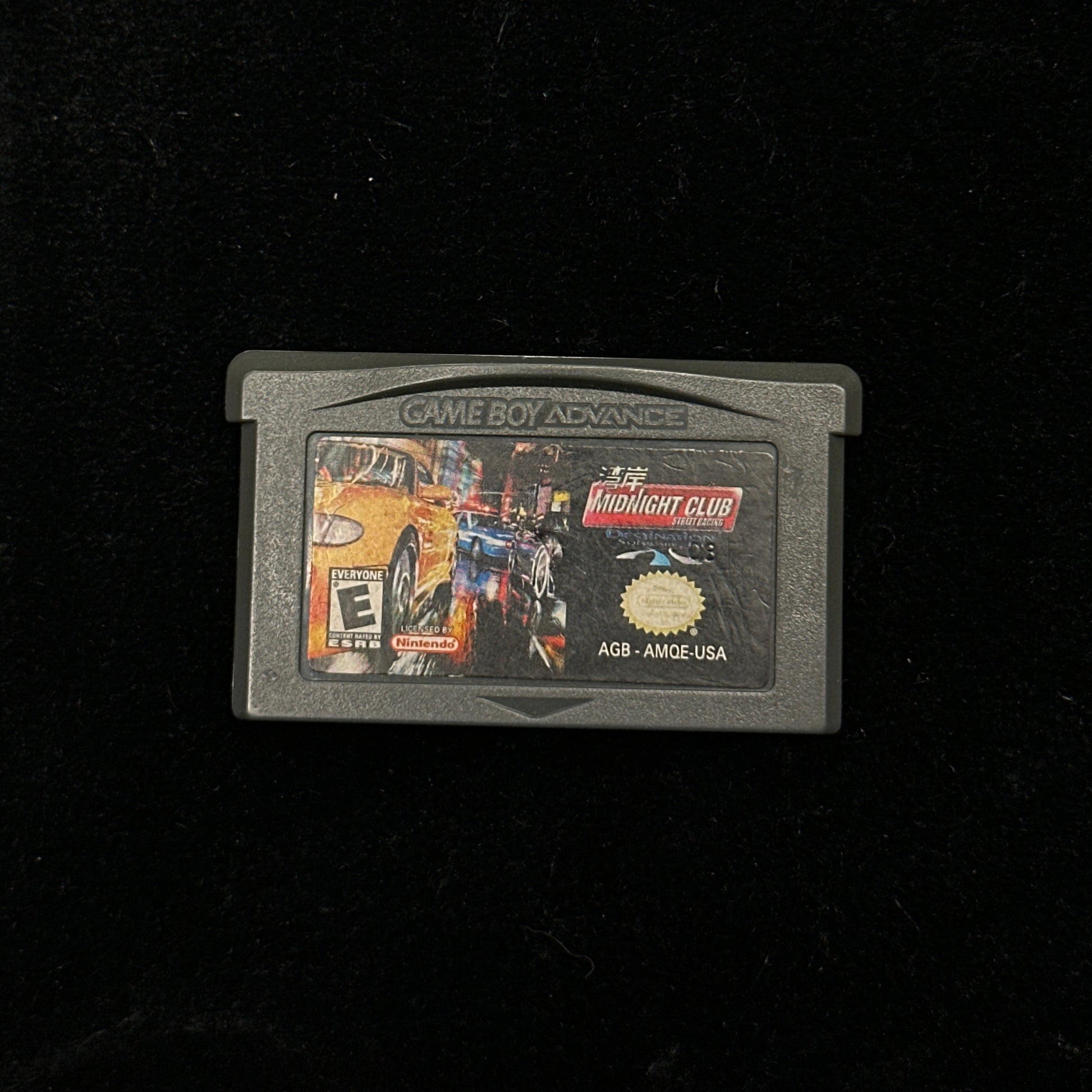 Game cartridge on a black background