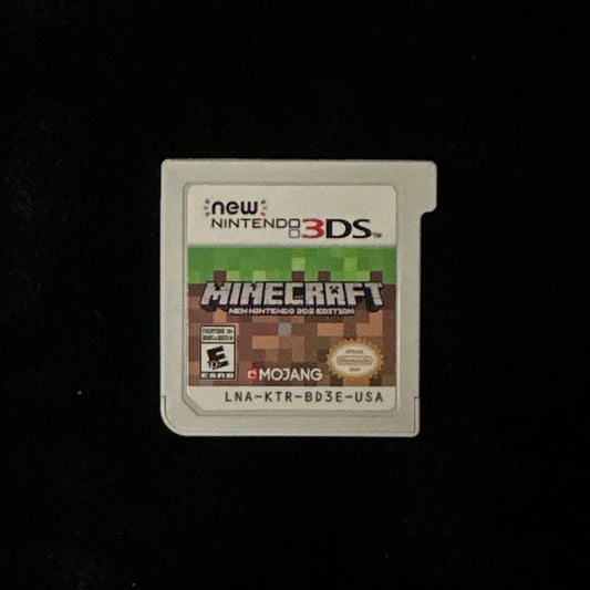 Nintendo 3DS Minecraft game cartridge on a black background.