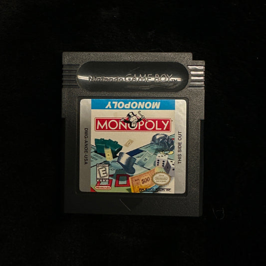 Nintendo Game Boy Monopoly game cartridge on a black background.