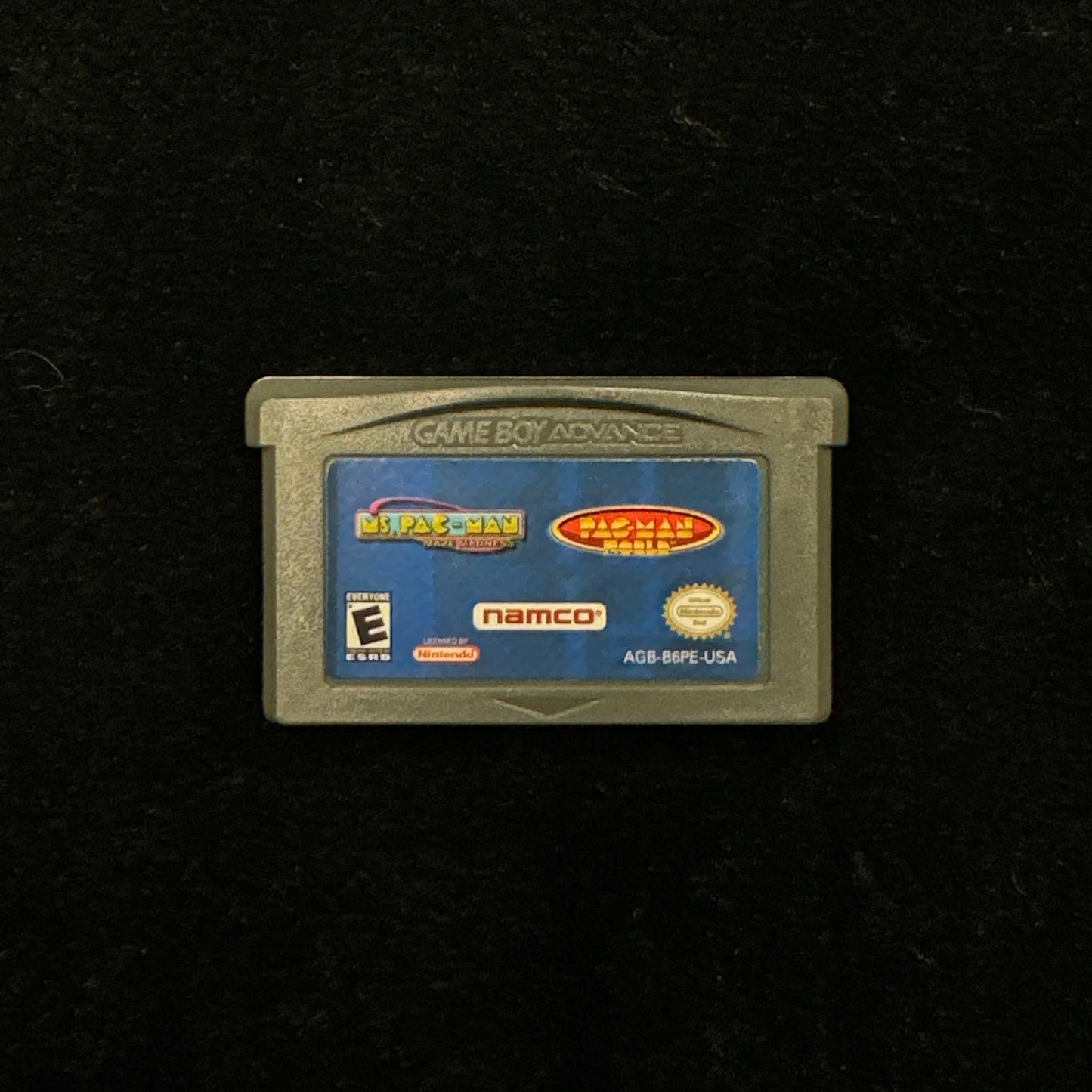 Game cartridge on a black background