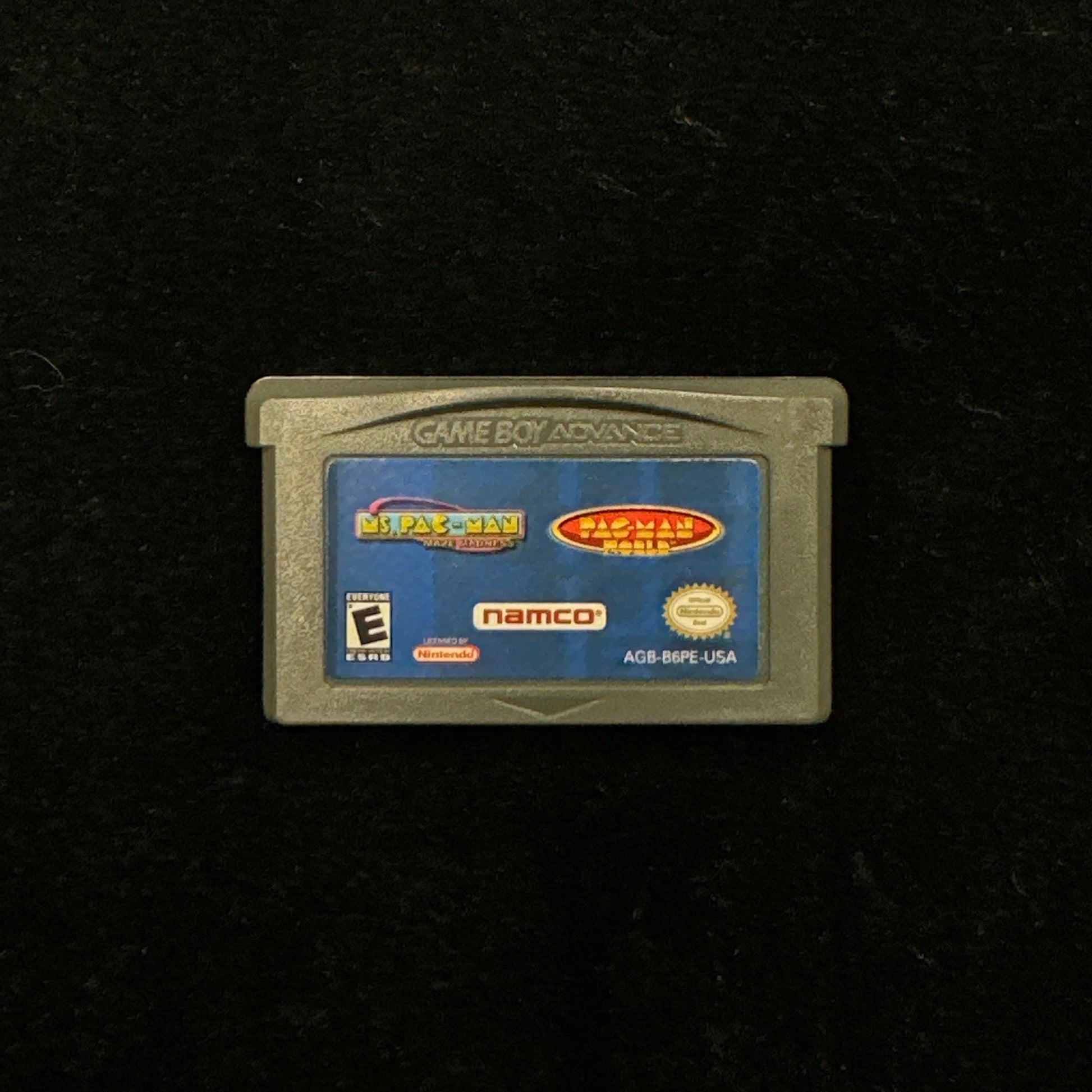 Game cartridge on a black background