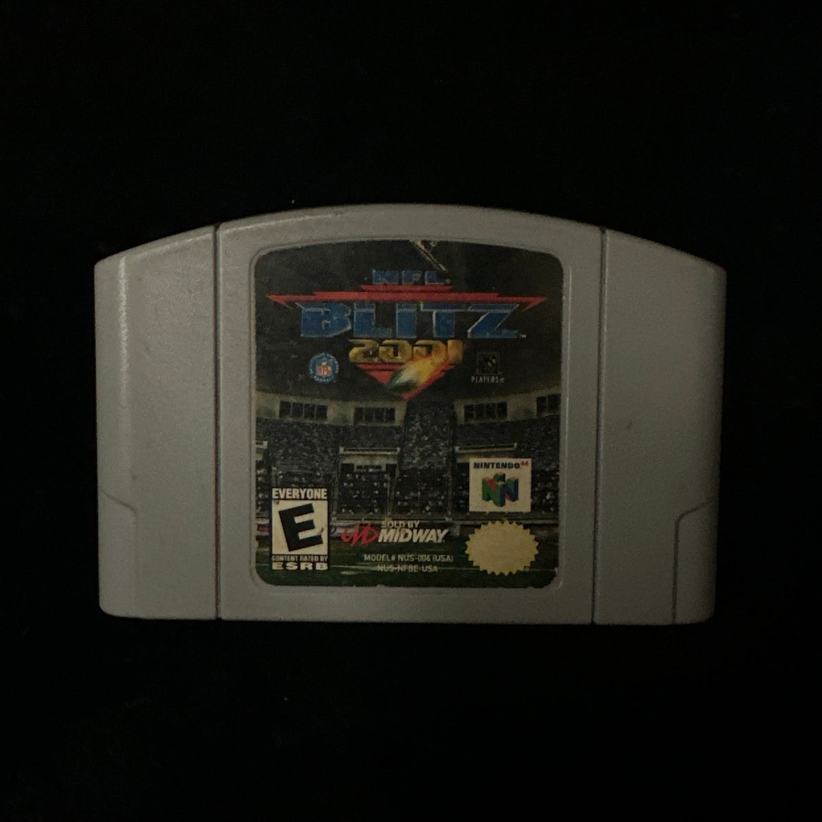 A Nintendo 64 game cartridge for 'NFL Blitz' on a plain black background.
