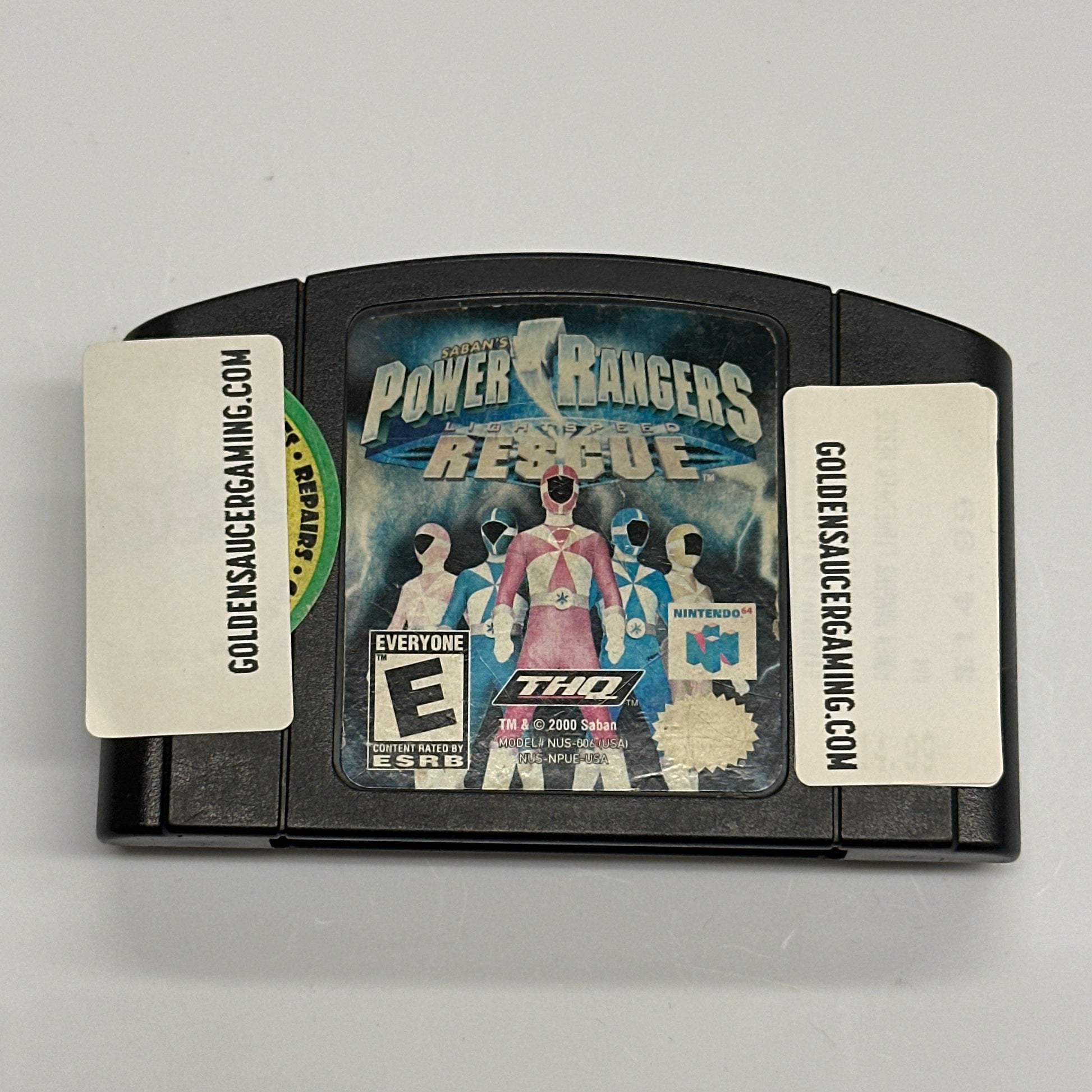 Game cartridge with 'Power Rangers' branding on a white background