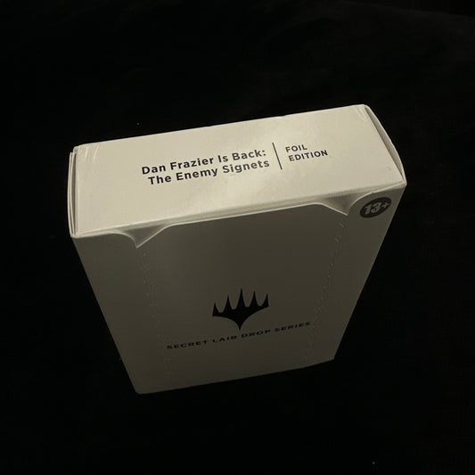 Product packaging with mtg logo on a dark background